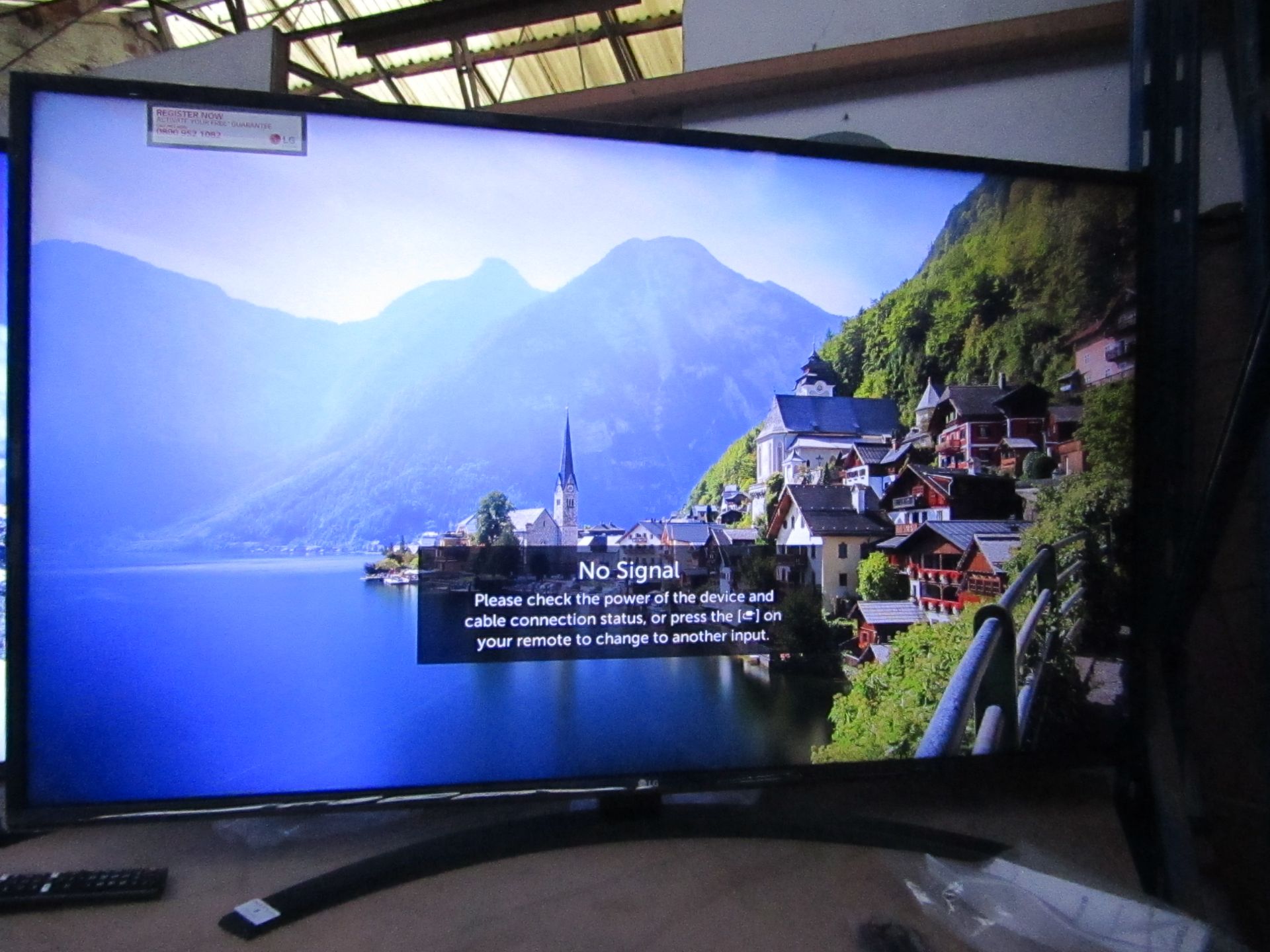 LG 49UM7400PLB smart 4K tv, tested working with remote control, stand nad original box, sticker on