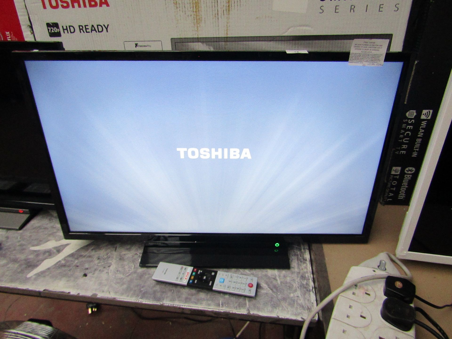 Toshiba 32W2863DB 32" Full HD LED Smart TV, tested working with original box and remote control.