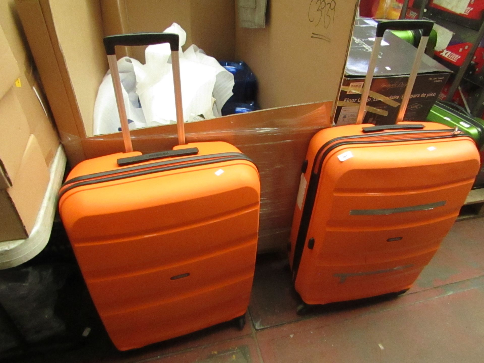 2 x American Tourister Suitcases. These have been used and have a few scuffs but still usable