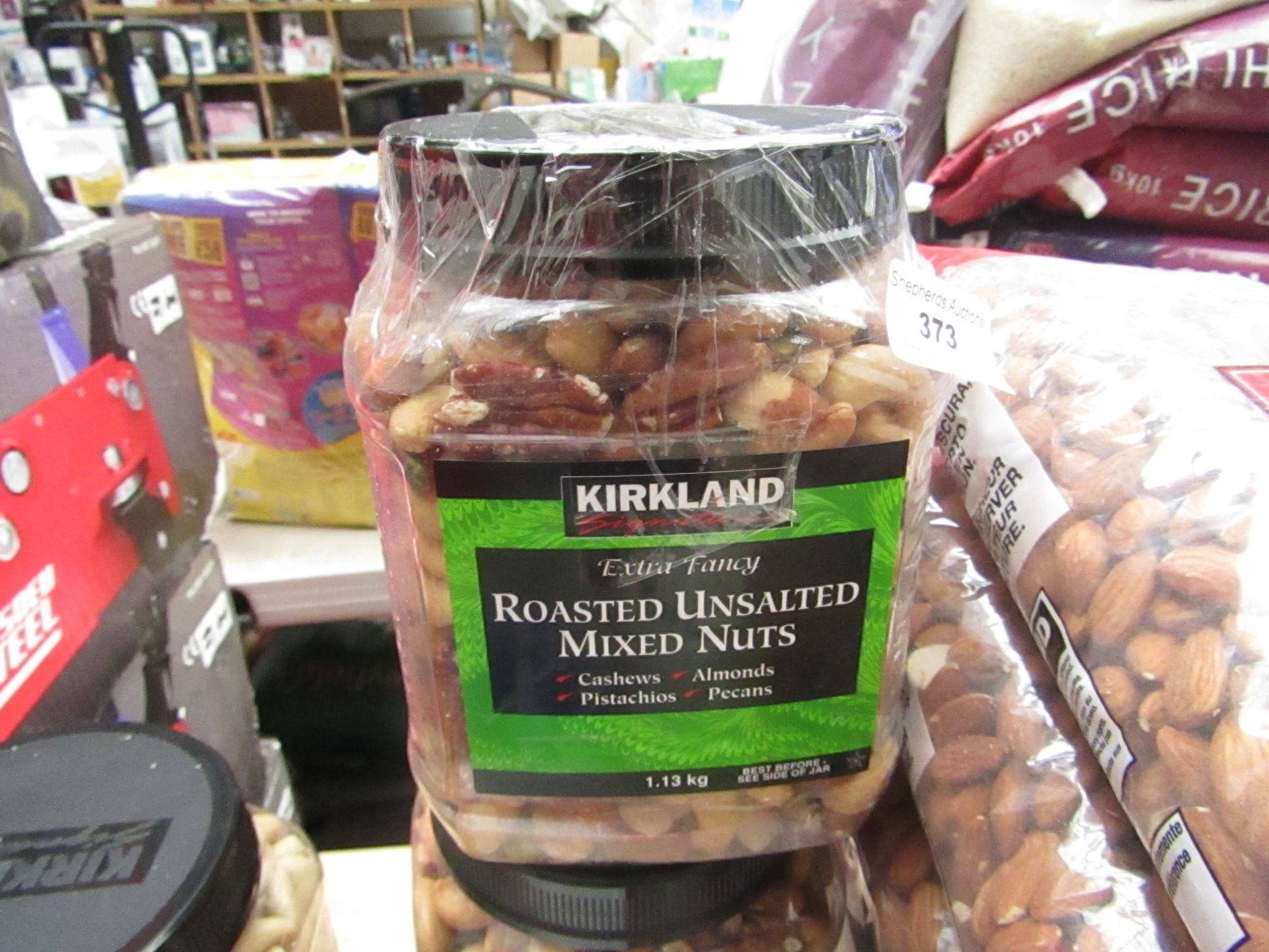 Kirkland 1.13kg Roasted Unsalted Mixed Nuts. Tub has split but has been repaired. BB 11/12/20