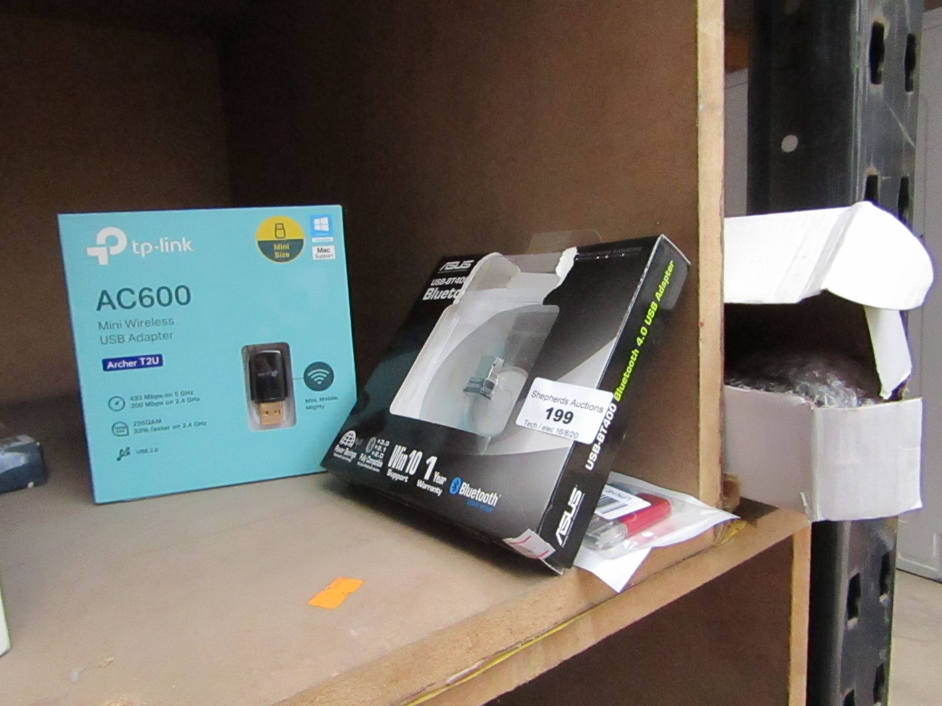 2x items being a TP Link AC600 mini wireless adaptor and a ASUS USN-BT400 Bluetooth USB adaptor,