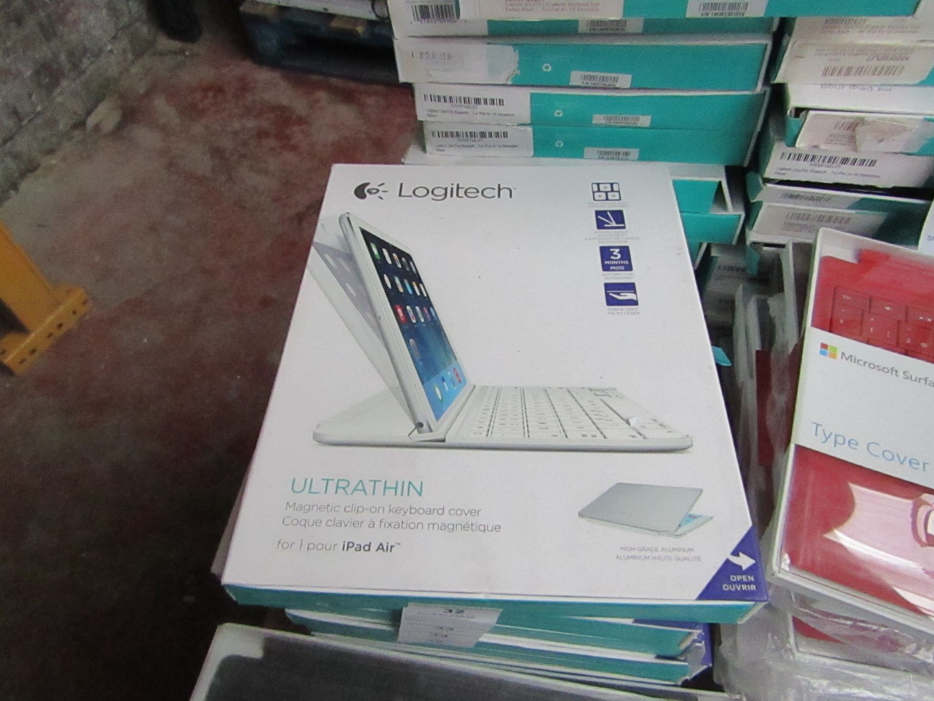 Logitech Ultra Thin magnetic clip on keyboard cover for iPad Air, untested and boxed. QWERTY