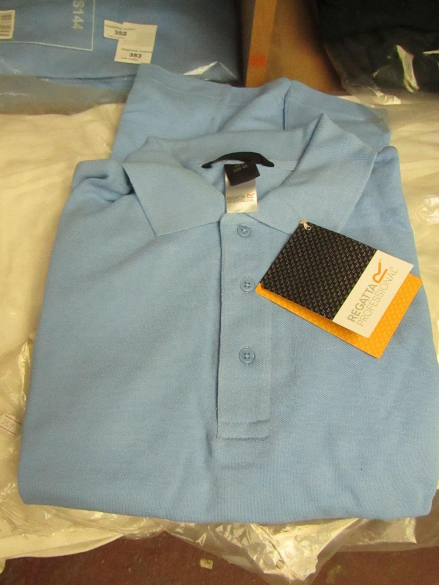 Regatta Blue Polo shirt, new, Size 10