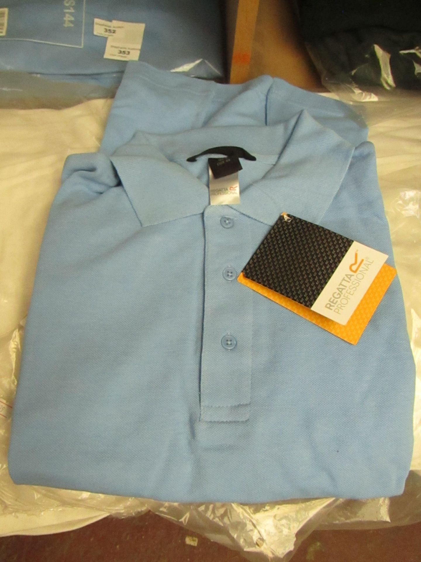 Regatta Blue Polo shirt, new, Size 10