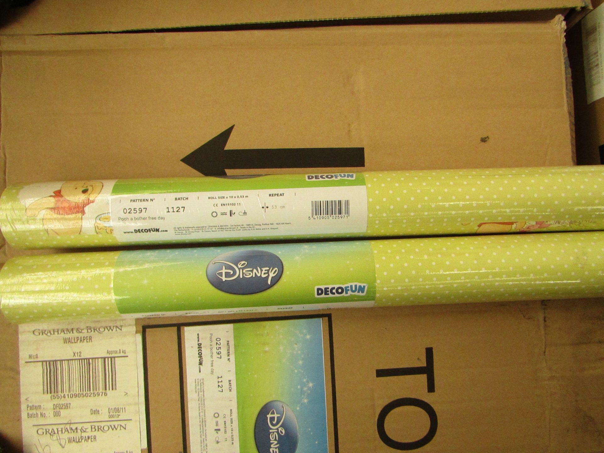 Box of 12 Rolls of Winnie The pooh Wallpaper. Packaged