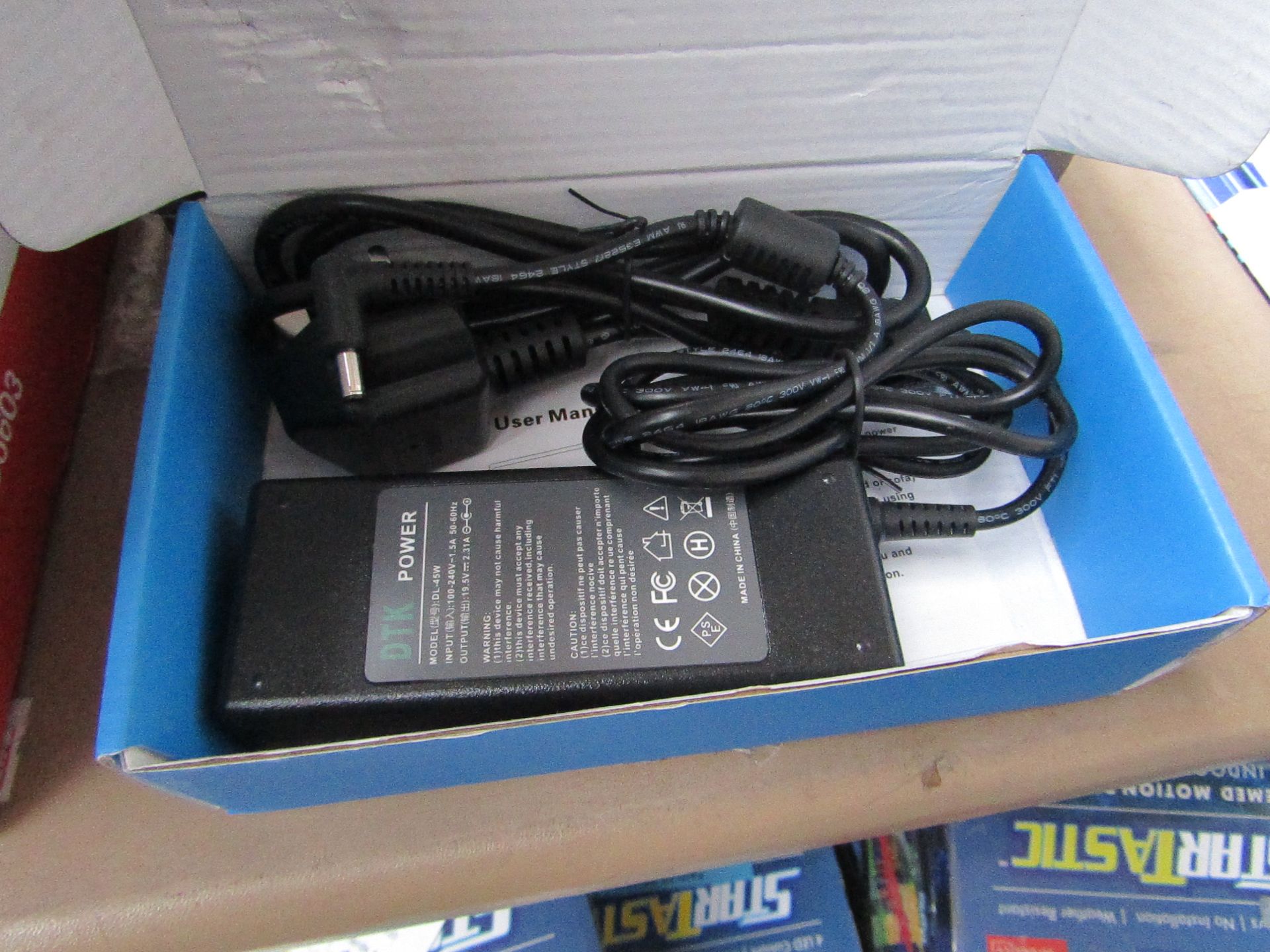 After Market replacement laptop power supply for unknown make and model, it looks simular to a