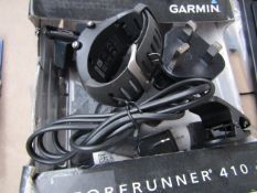 Garmin Forerunner 410 training watch, powers on and the touch bezel works, comes with charger