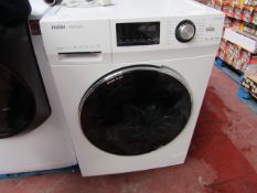 Haier Hatrium direct motion 10Kg washing machine, powers on and spins.