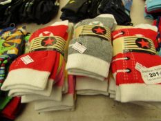 18 Pairs of Size 9 - 12 Girls Socks. New with tags.