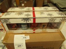 2 packs of 5 Festive Candle Sets. New & Packaged