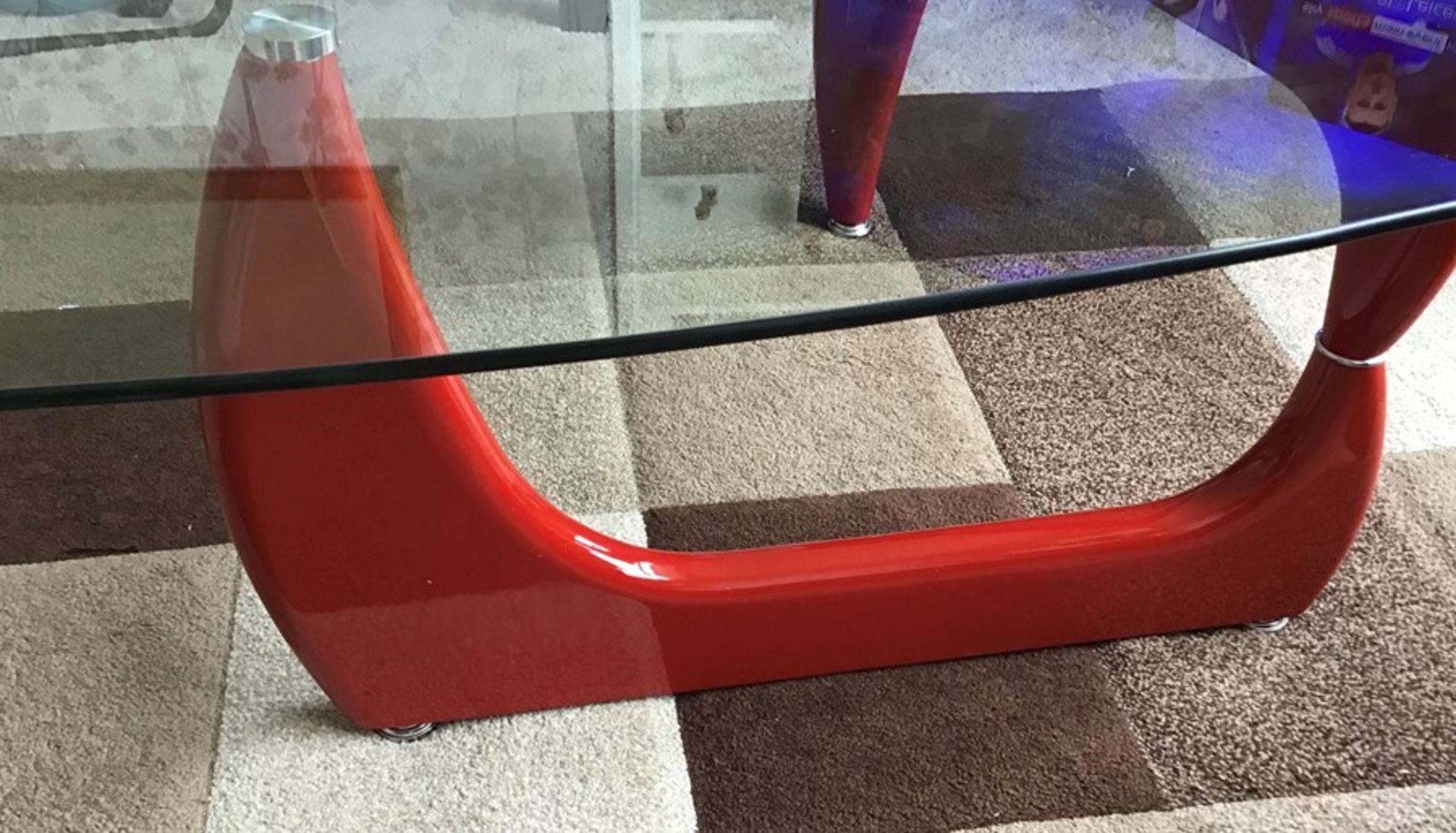 Clear glass coffee table with glossy red legs, brand new and boxed. - Image 2 of 2