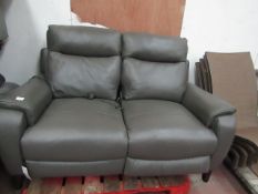 Grey leather Power reclining 2 seater sofa, tested working, has a bit of damage to the back corner