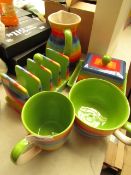 5 Piece Rainbow Set Being: 1x Toast Rack. 1x Butter Dish. 1x Milk Jug. 1x Large Coffee Mug. 1x Mug.