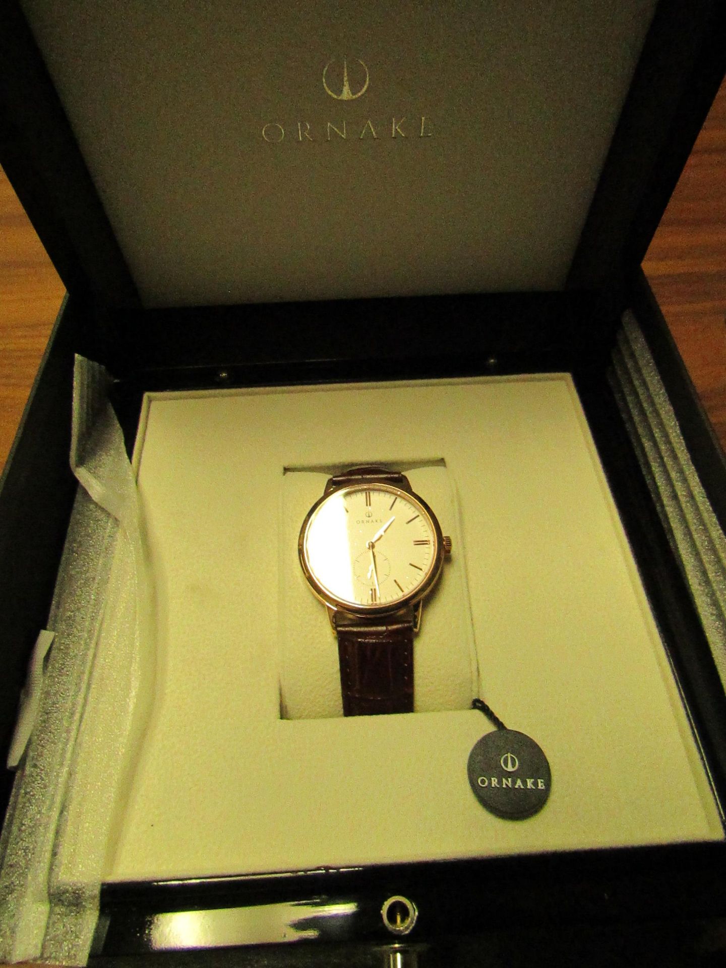 Ornake watch, miyota movement, white and gold with brown leather strap, new, Boxed and ticking.