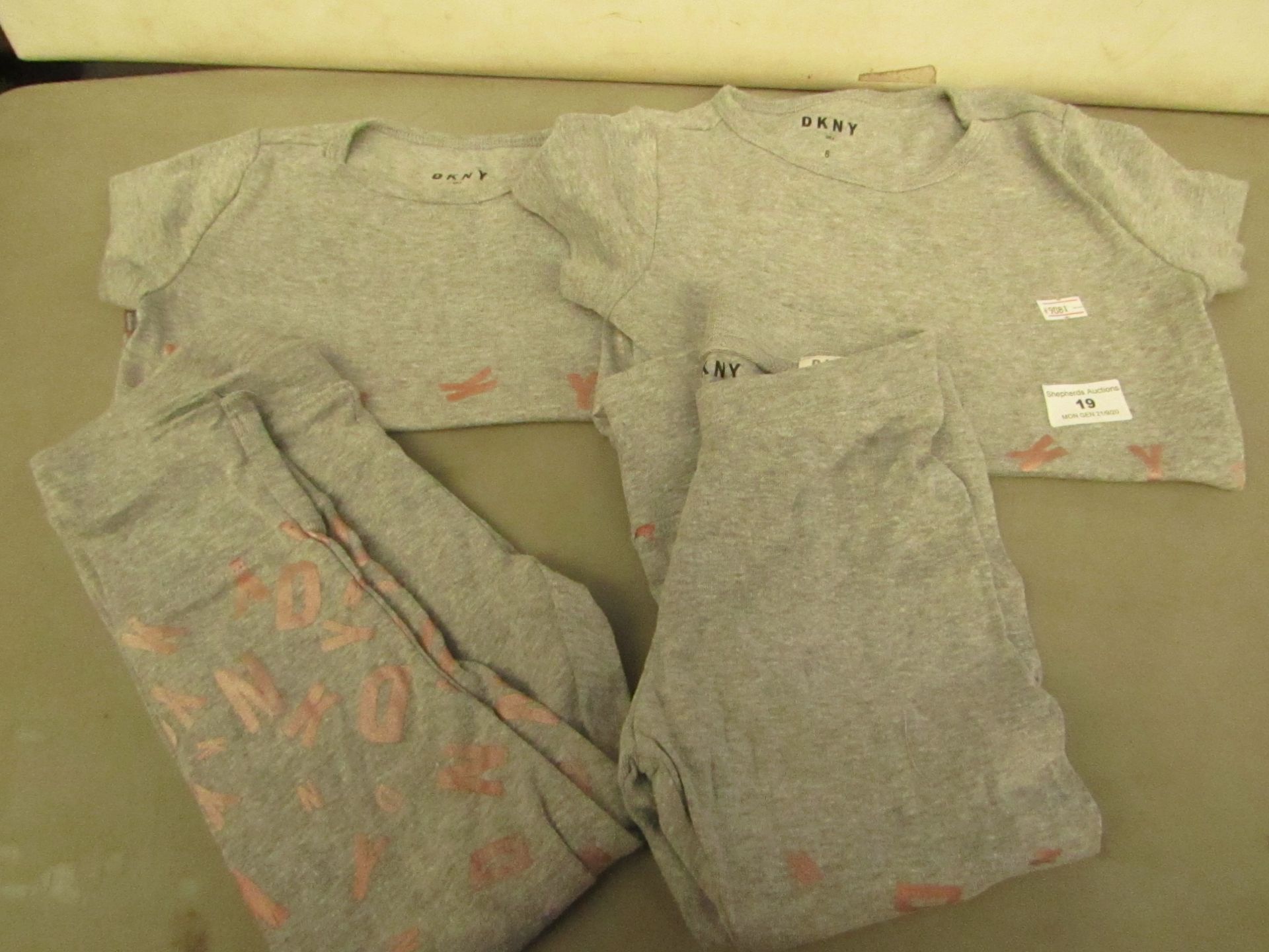 4 x DKNY Items Being 2 Pairs of Joggers Size 4T & Size 6 & 2 x Tops 1 Being size 4T & the other Size
