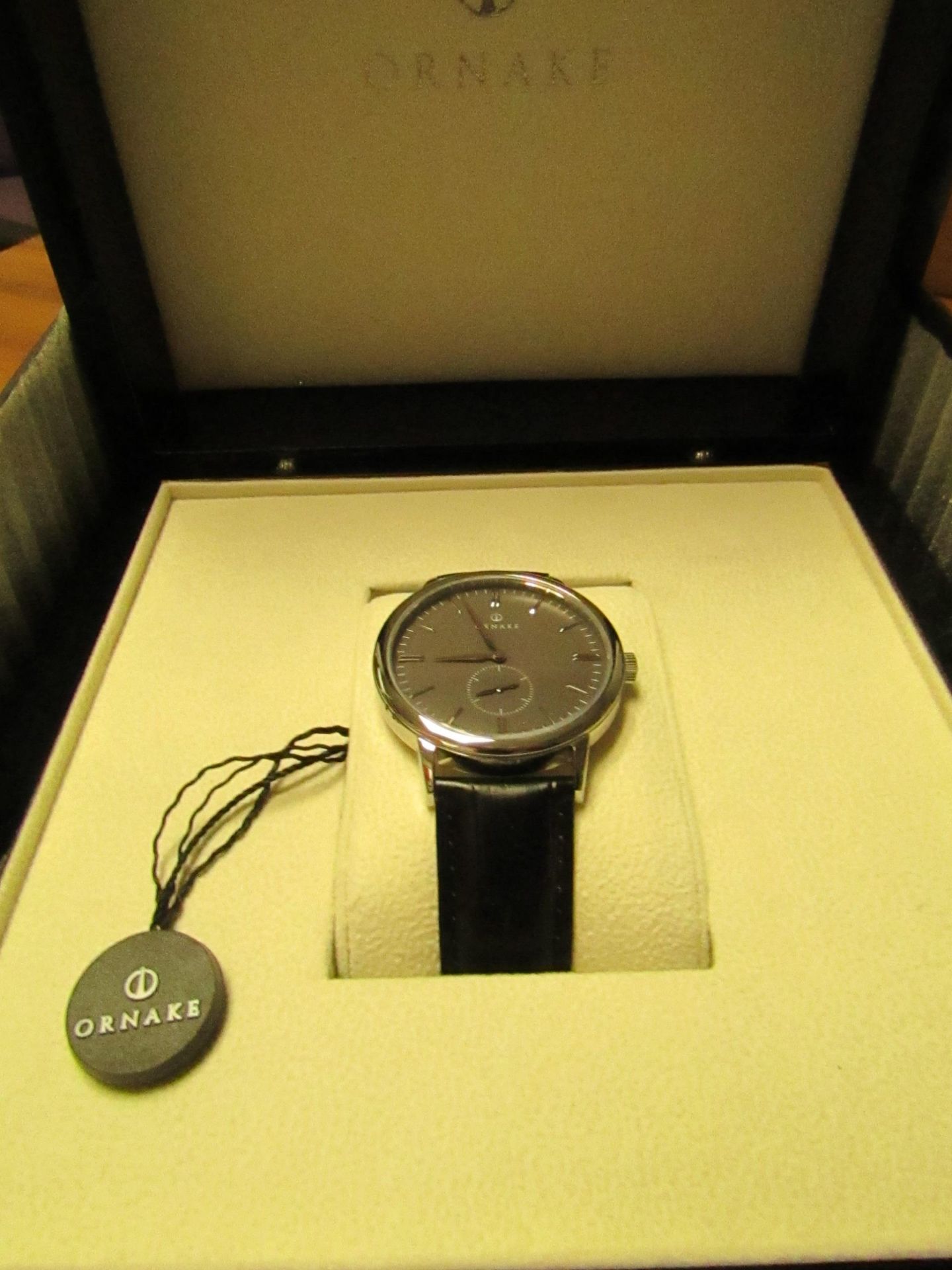 Ornake watch, miyota movement, black and silver with black leather strap, new, Boxed and ticking.