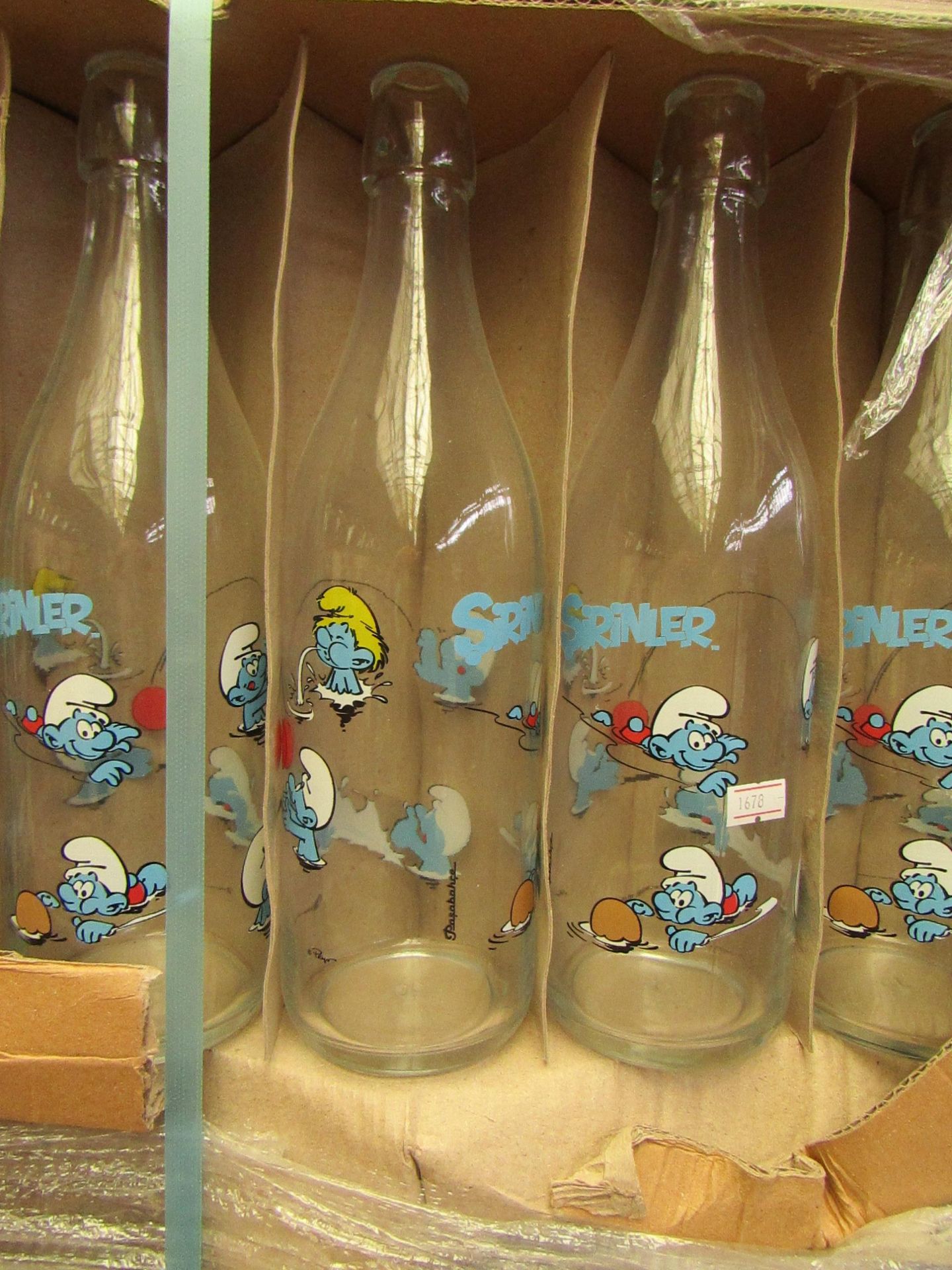 6 x Large Smurf Design Milk Bottles. Unused