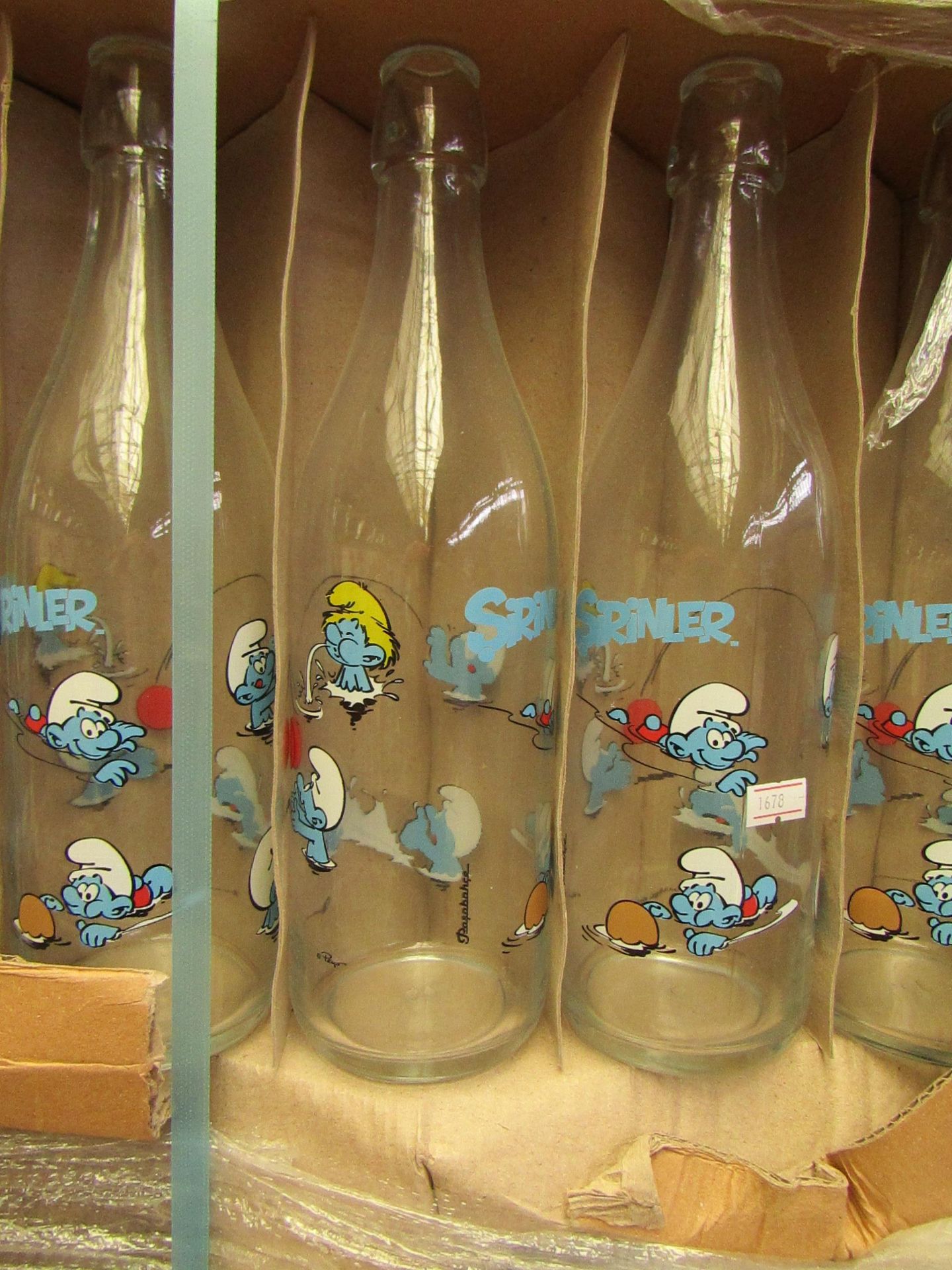 6 x Large Smurf Design Milk Bottles. Unused