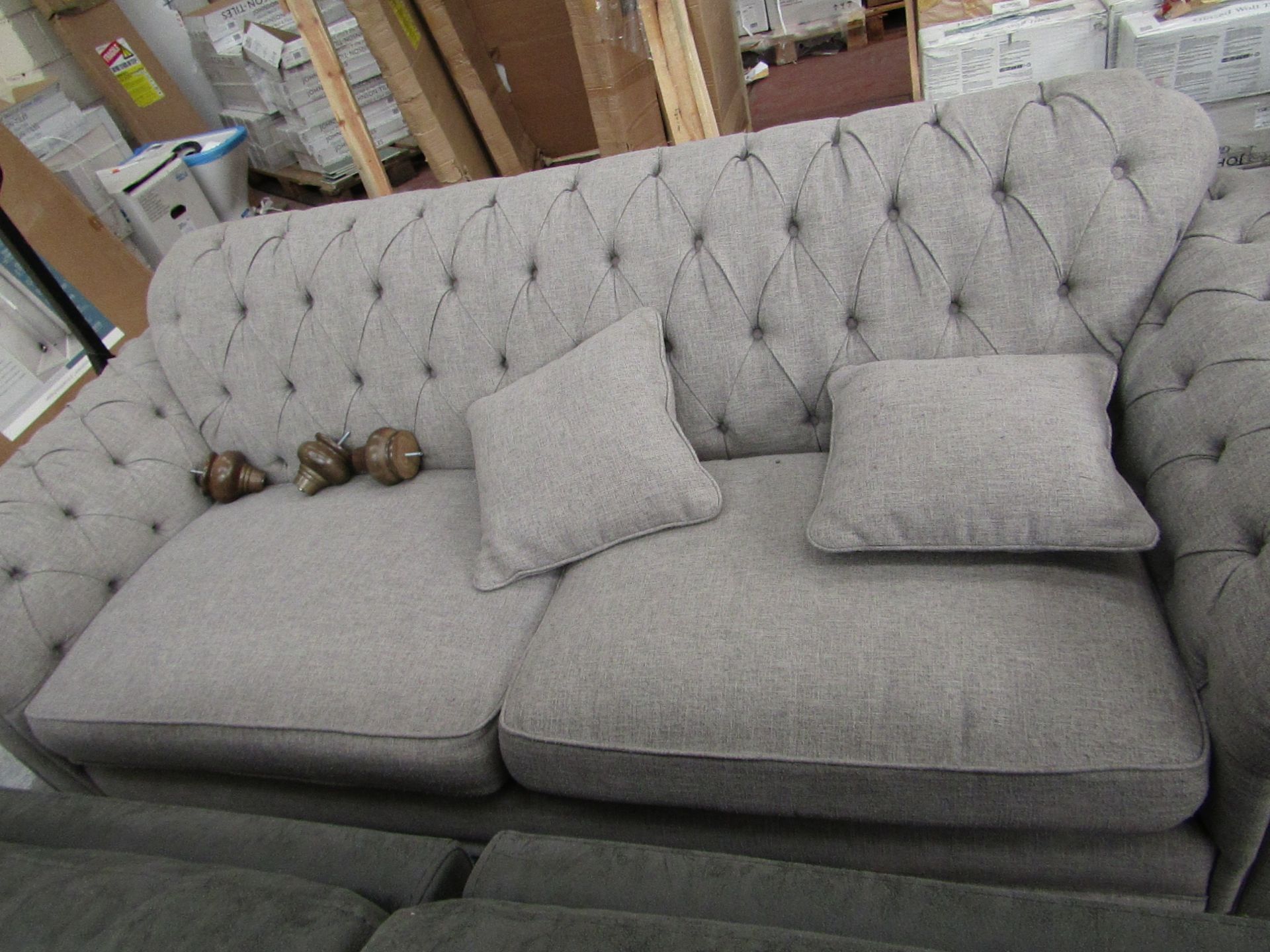 Costco button back 3 seater sofa with cushions, no major damage. RRP Circa £1500.00