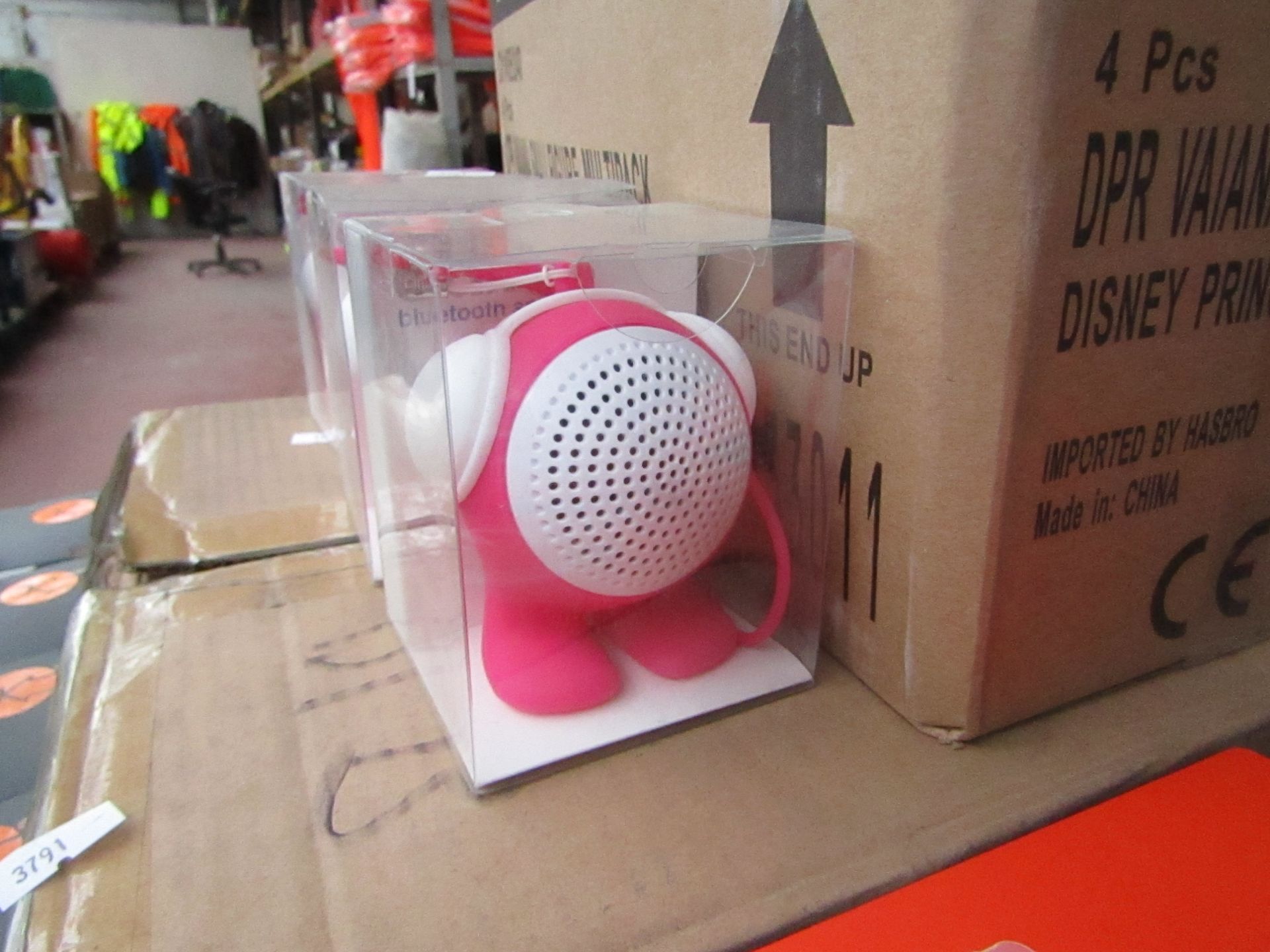 4x Small portable keyring speakers, new and packaged.