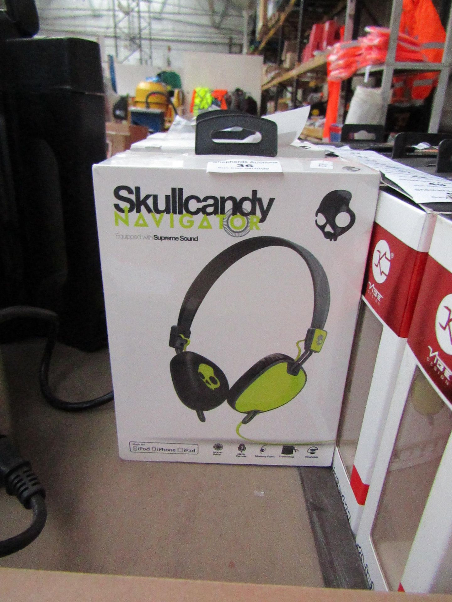 Skull Candy on ear headphones, unchecked and boxed.