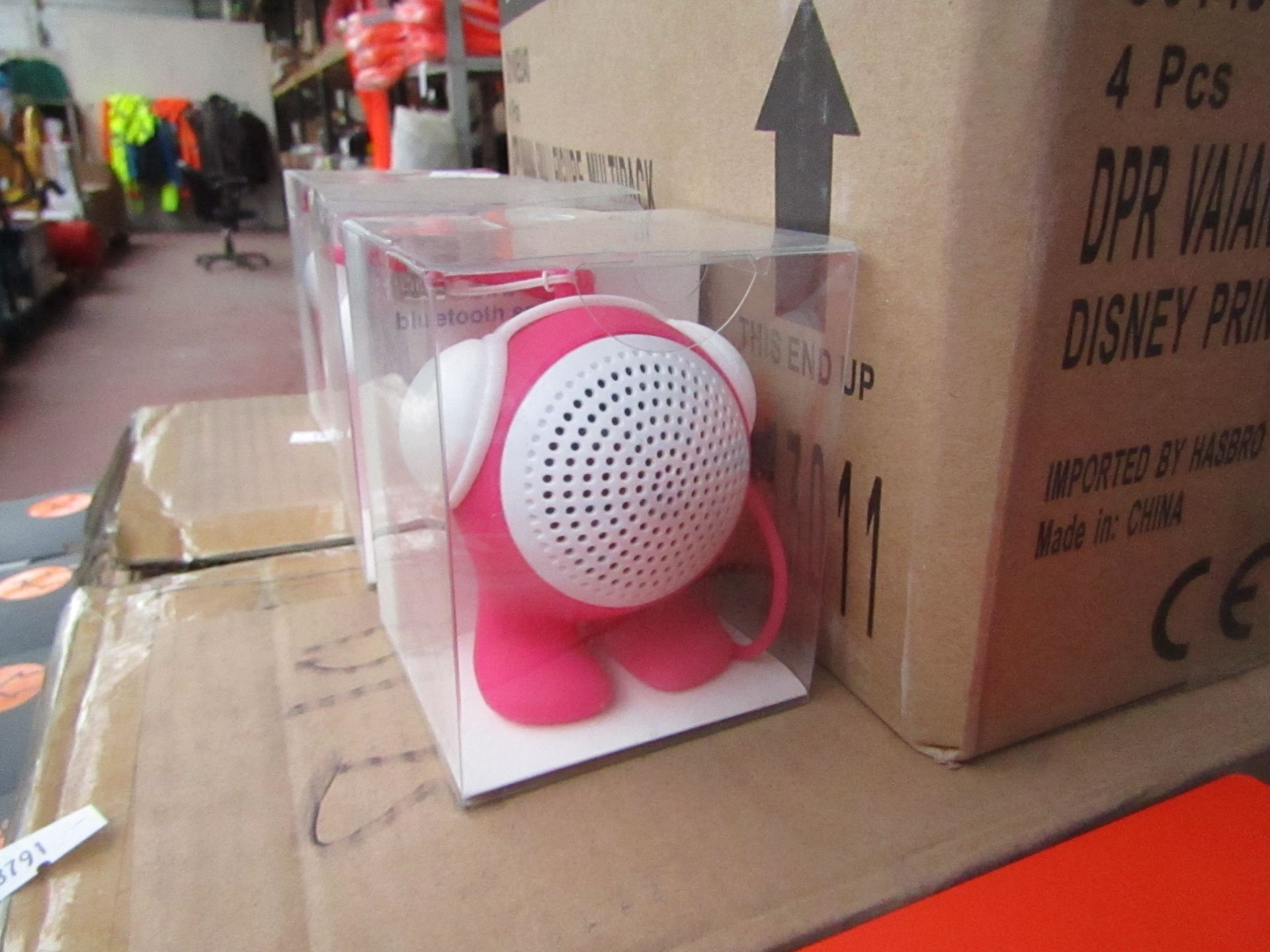 4x Small portable keyring speakers, new and packaged.