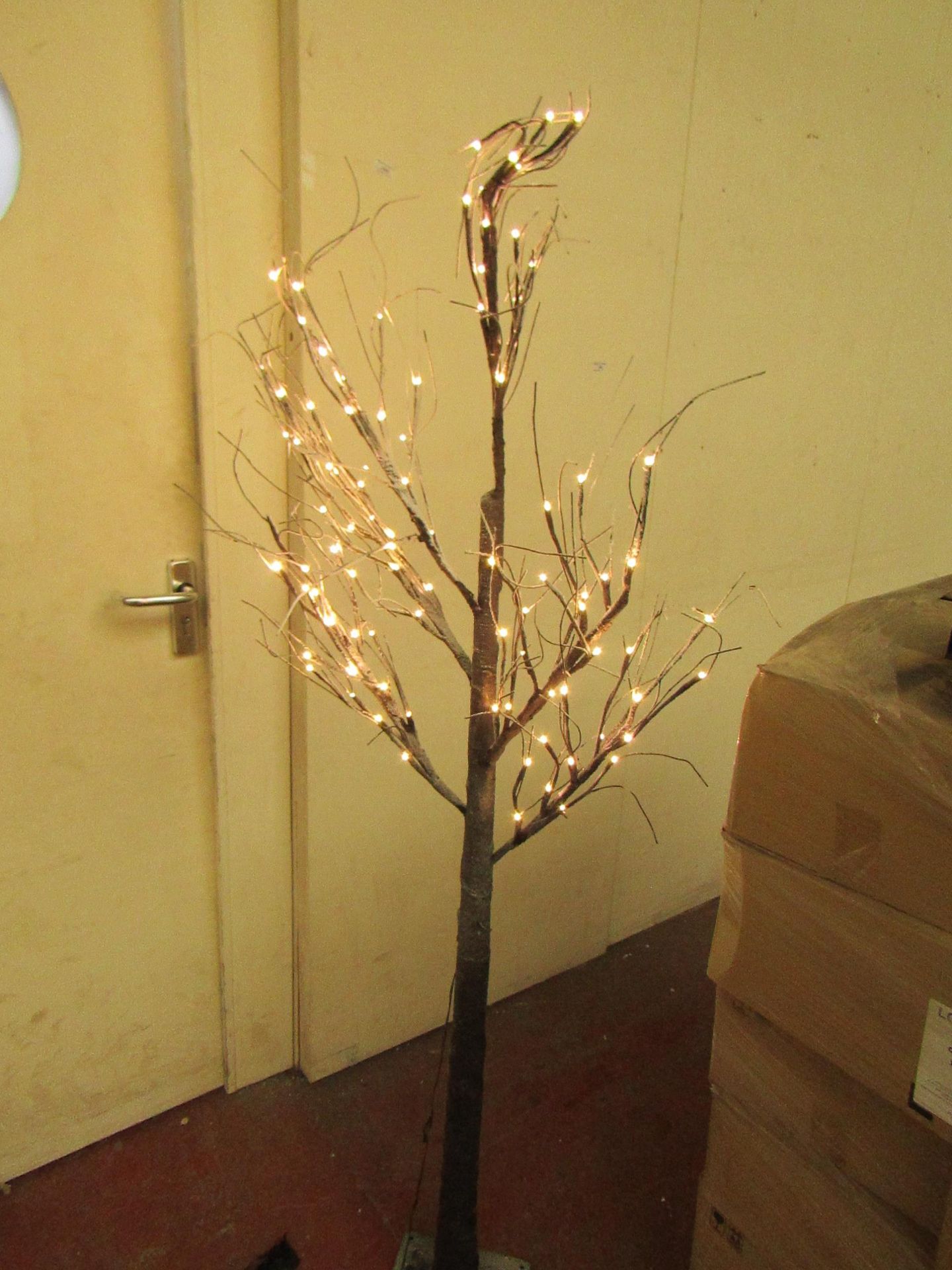 210cm Snowy Effect Brown Tree. Boxed but unchecked