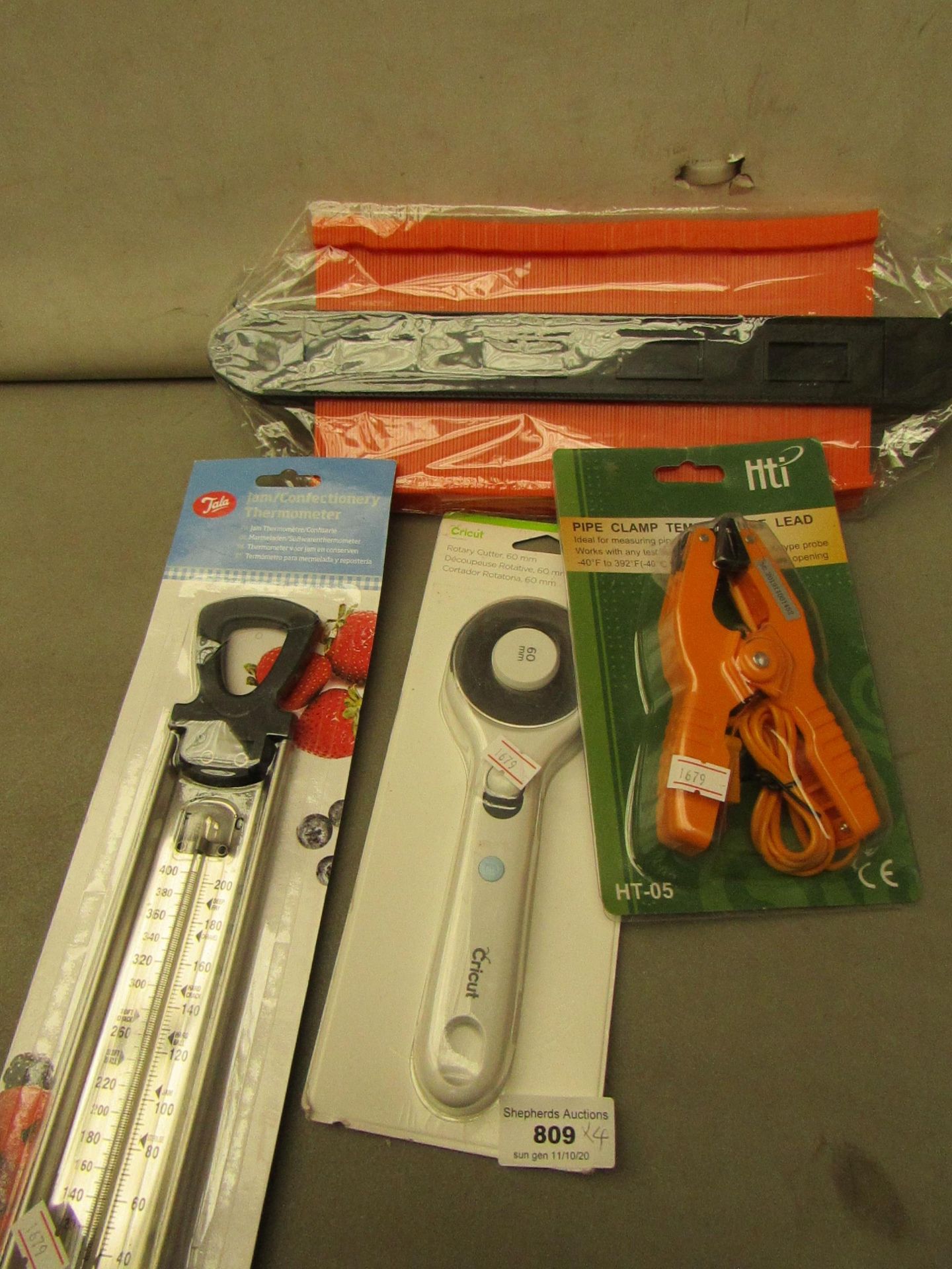 4 Items Being a 60mm Rotary Cutter, Thermometer,Pipe clamp temp lead