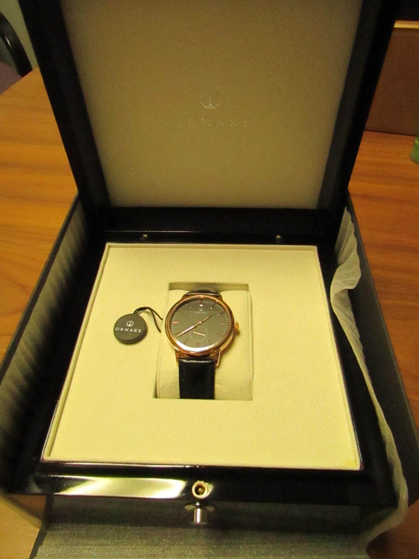 Ornake watch, miyota movement, black and gold with black leather strap, new, Boxed and ticking.