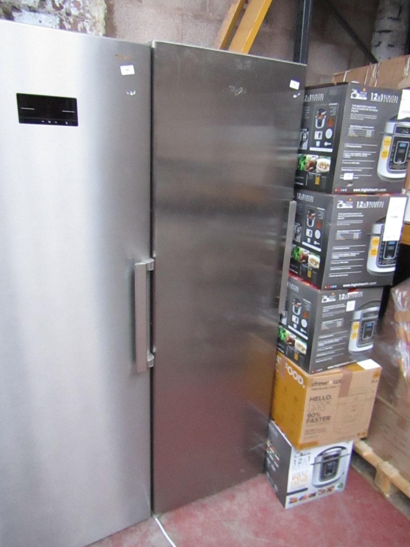 Whirlpool tall freestanding freezer, tested working for coldness but heavily used inside.