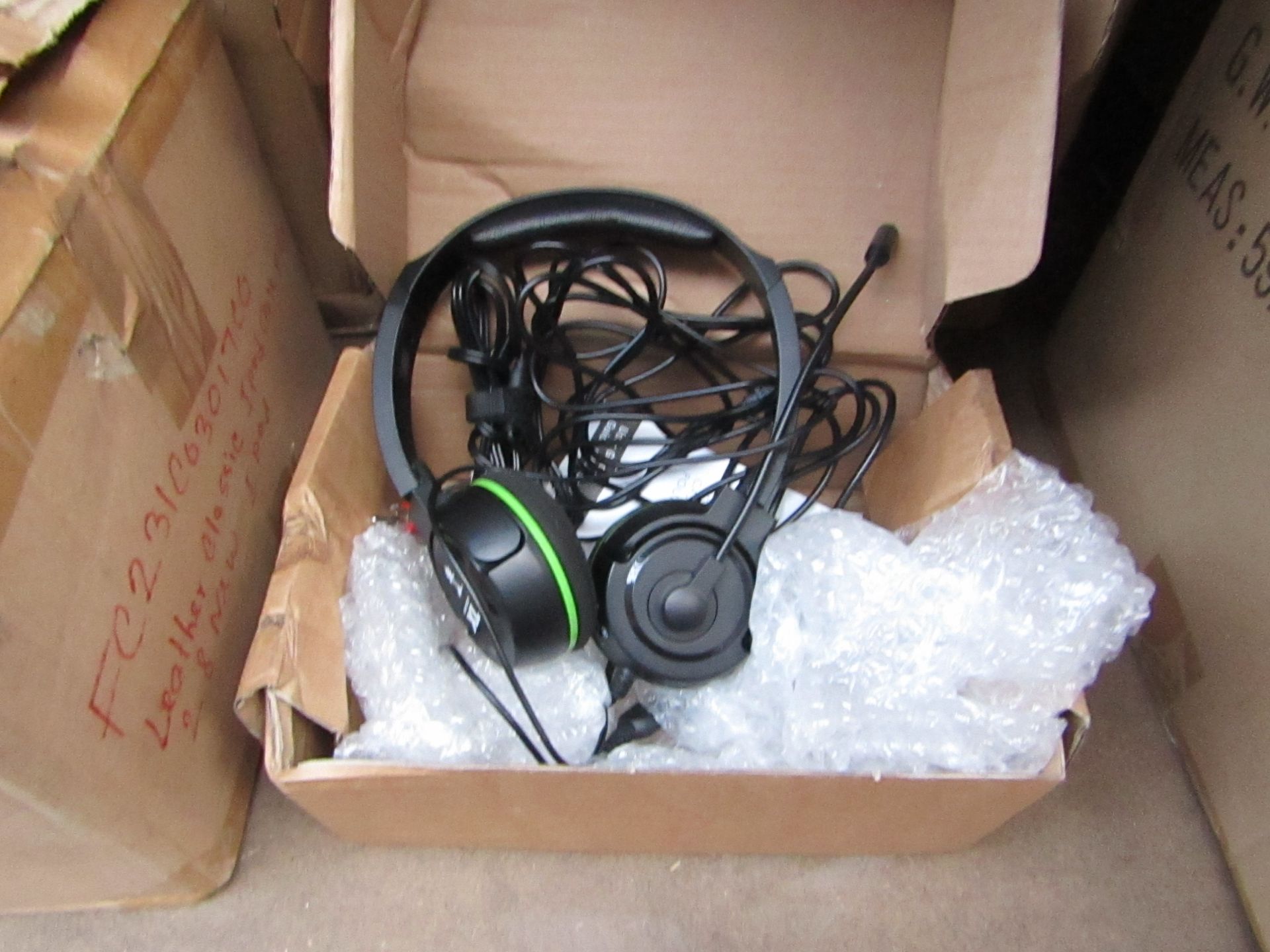 Turtle Beach gaming headphones, unchecked and boxed.