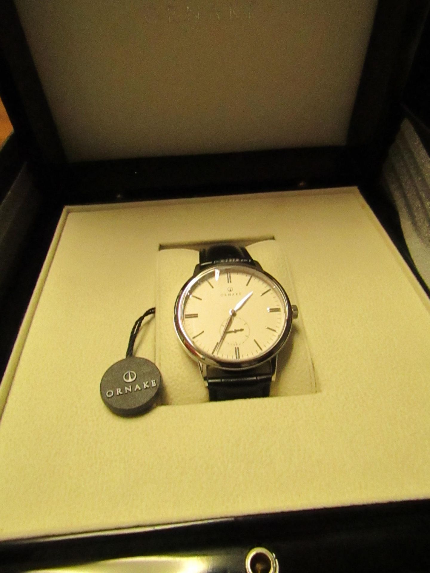 Ornake watch, miyota movement, white and silver with black leather strap, new, Boxed and ticking.