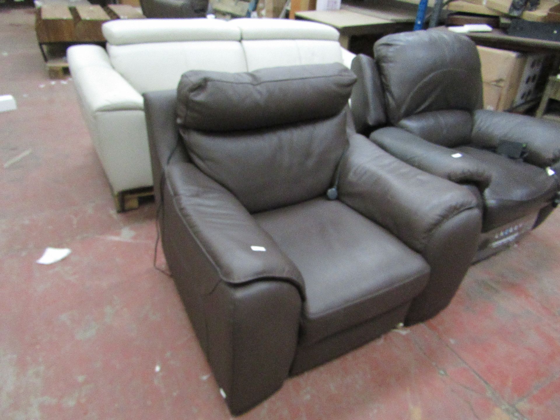 Costco leather power recliner arm chair, untested.