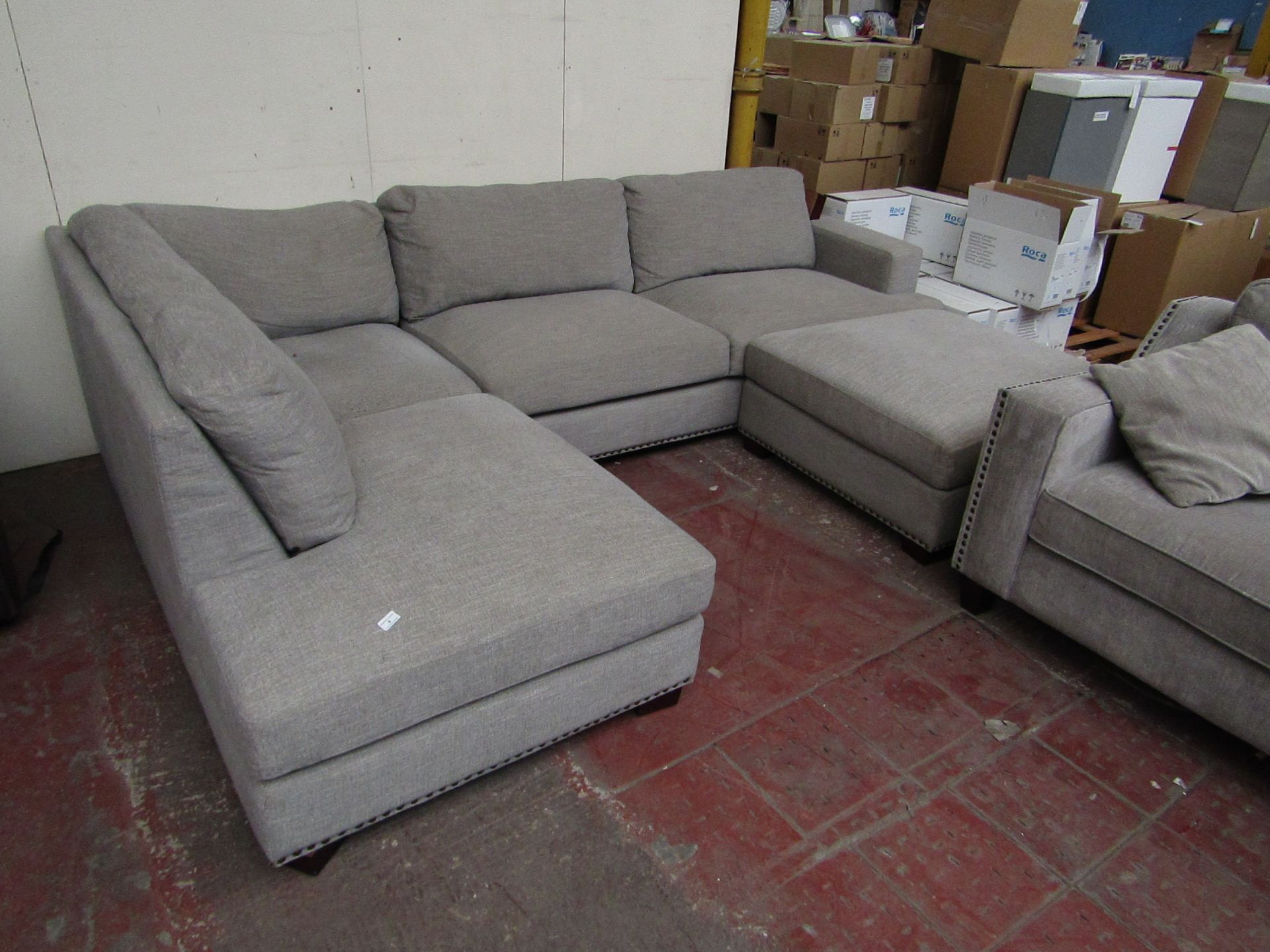 Costco corner sofa with button base, in used condition.