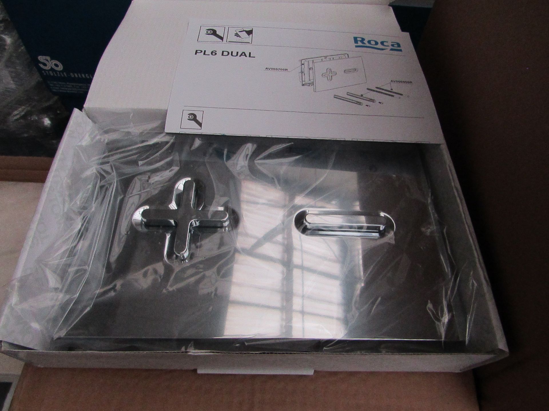 Roca PL6 dual chrome flush plate, new and boxed.