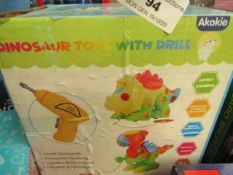 Akokie - Dinosaurs Toys With Drill - Unused & Boxed.