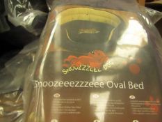 Snoozzzeee 23" Oval Dog bed in Purple. New & packaged