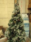 6 Foot Snowy Chrstmas Tree. Has lights on but they are not very bright. Unused