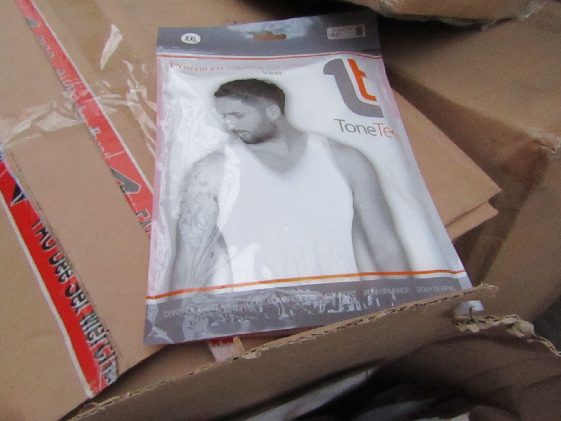 | 1X | PALLET OF APPROX 390 TONE TEE COMPRESSION tops, NEW IN PACKAGING SIZE XL, PALLET MAY