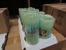 8 x Indoor Battery Operated LED Candles with 4hr or 8hr auto options new & packaged (batteries not