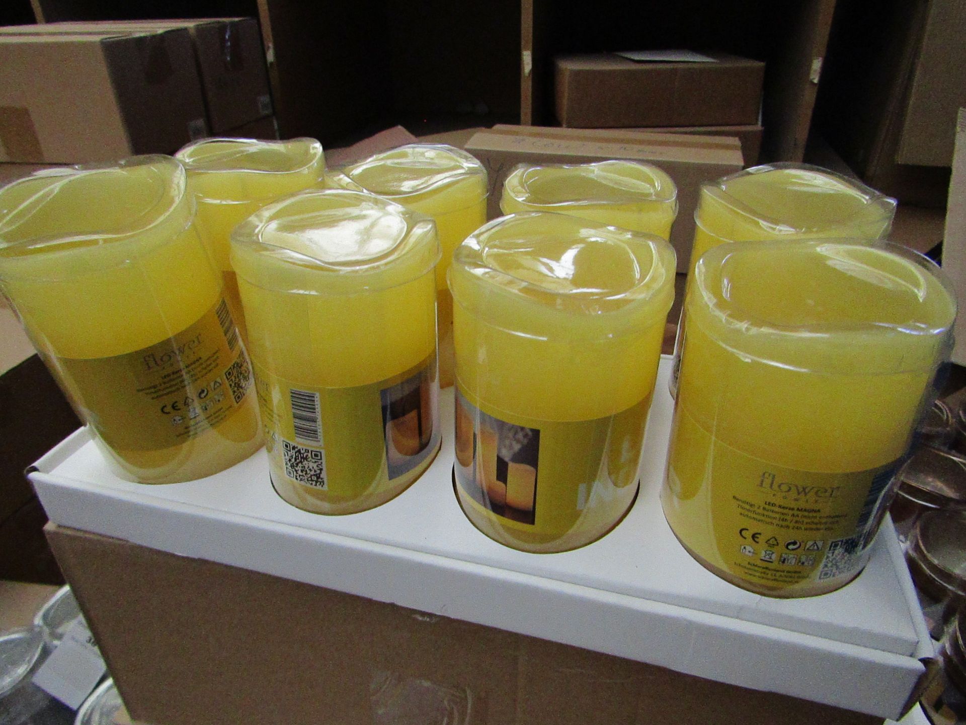 8 x Indoor Battery Operated LED Candles with 4hr or 8hr auto options new & packaged (batteries not