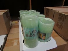 8 x Indoor Battery Operated LED Candles with 4hr or 8hr auto options new & packaged (batteries not