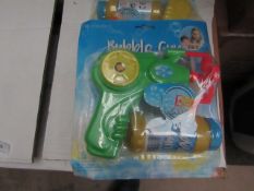 3 packs of 3 Bubble Guns with Solution. New & Packaged