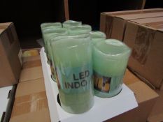 8 x Indoor Battery Operated LED Candles with 4hr or 8hr auto options new & packaged (batteries not