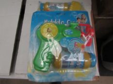 3 packs of 3 Bubble Guns with Solution. New & Packaged