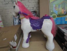 Feber Ride on Unicorn. Powers on & Works but is missing the Charger