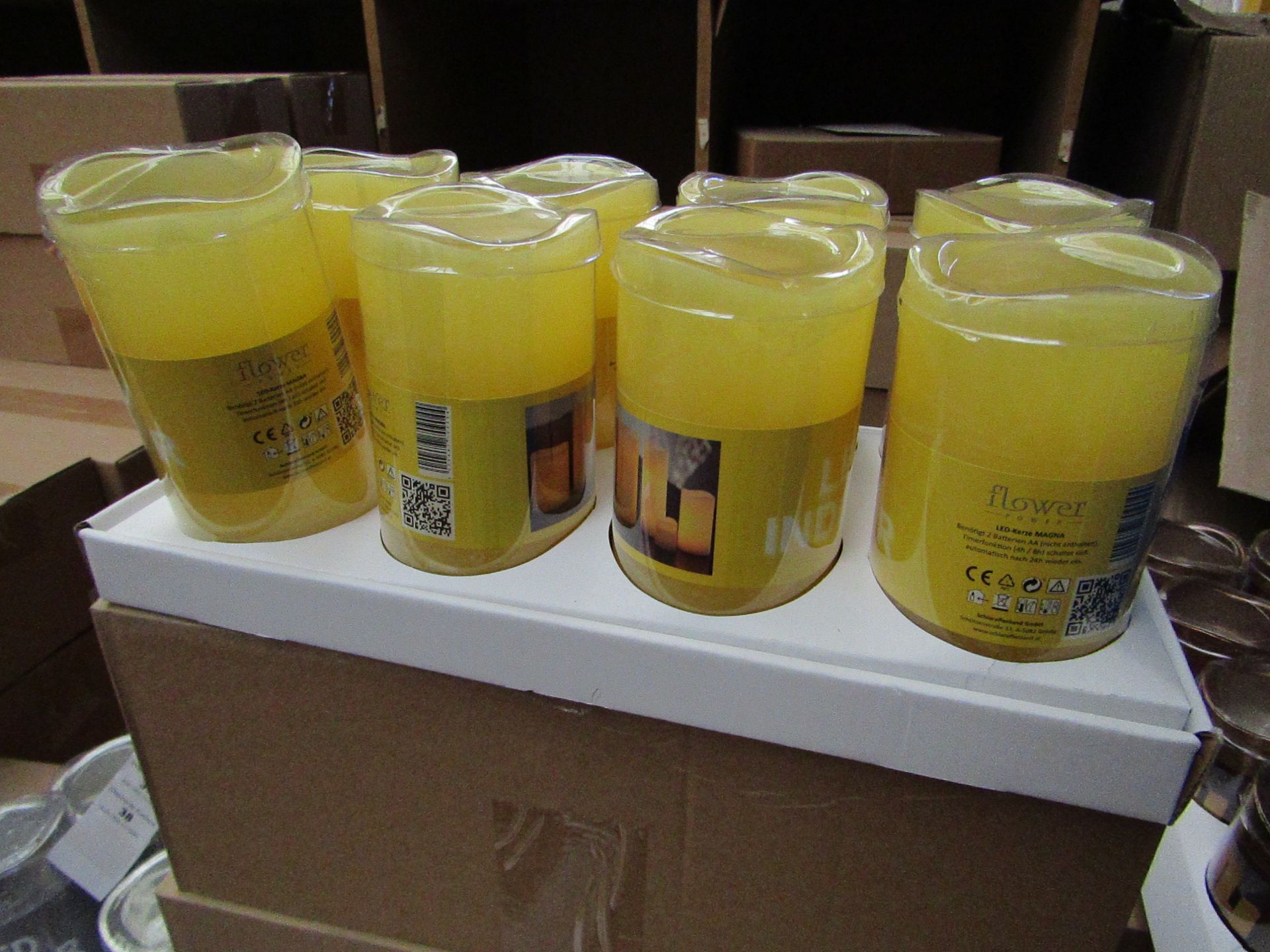 8 x Indoor Battery Operated LED Candles with 4hr or 8hr auto options new & packaged (batteries not