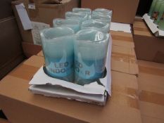 8 x Indoor Battery Operated LED Candles with 4hr or 8hr auto options new & packaged (batteries not