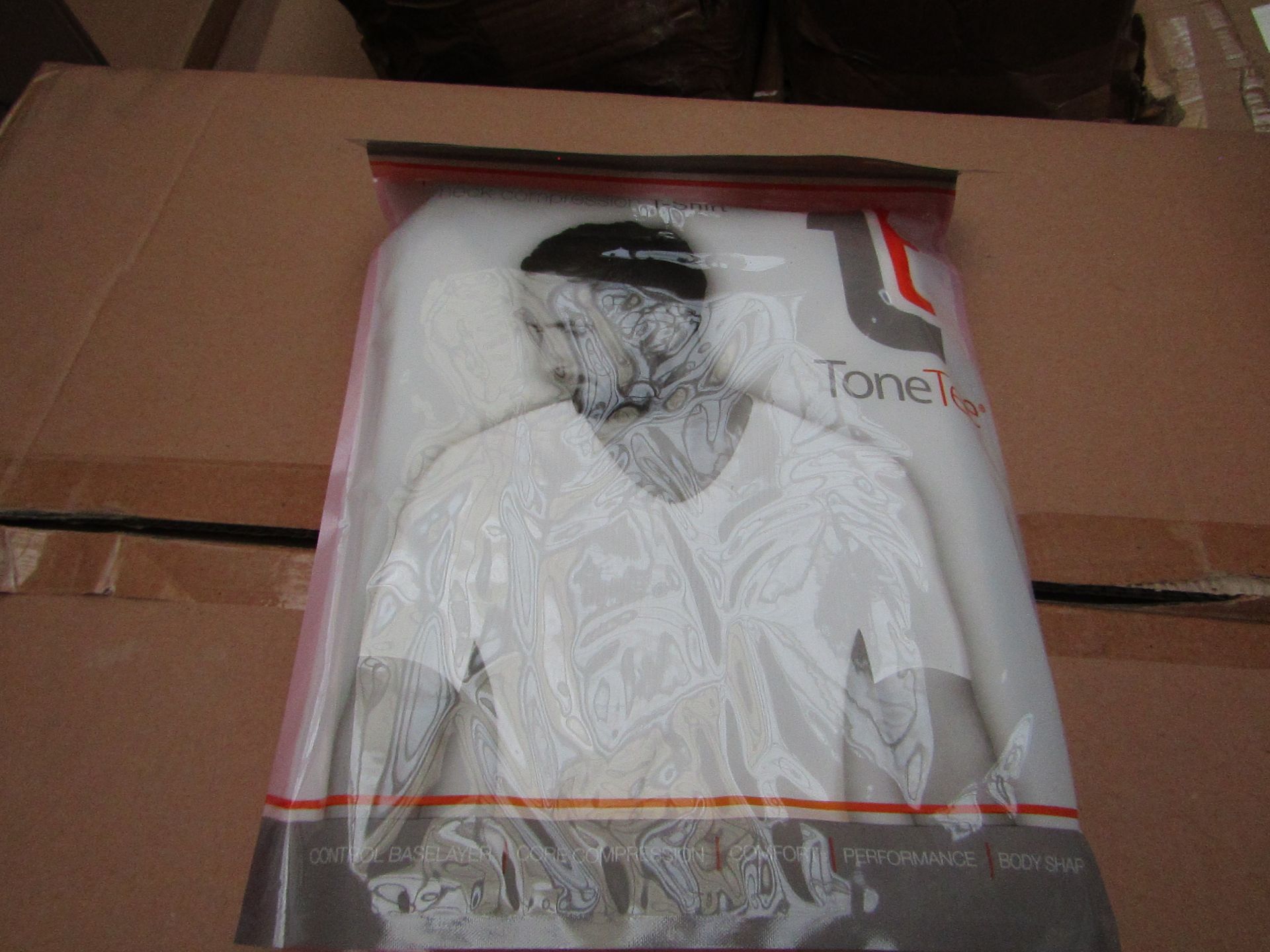 | 1x | TONE TEE V NECK COMPRESSION T-SHIRT WHITE XL | PACKAGED & BOXED | SKU 1508038582739 | RRP £