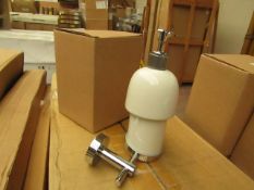 Ceramic soap dispenser with holder, new and boxed. AF46